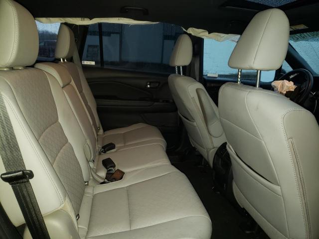 Photo 11 from auction – 2021 HONDA PASSPORT E with VIN 5FNYF8H59MB025678