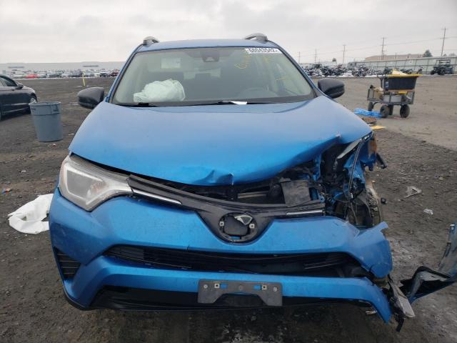 Photo 5 from auction – 2018 TOYOTA RAV4 LE with VIN JTMBFREV8JJ736177