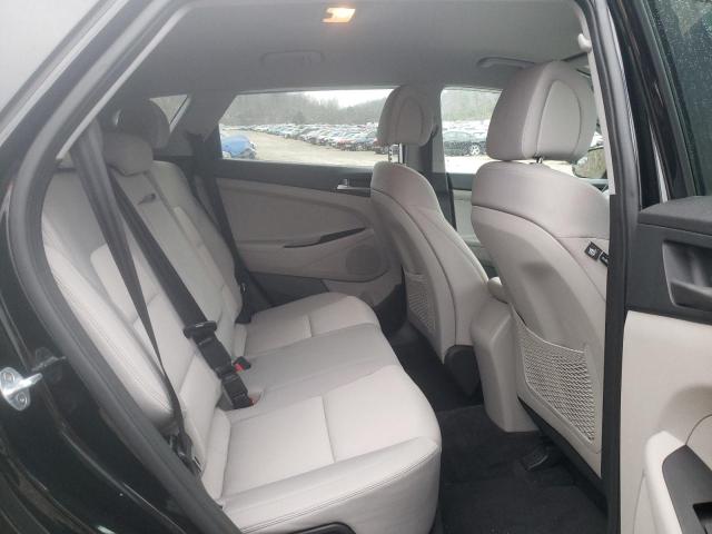 Photo 11 from auction – 2018 HYUNDAI TUCSON SE with VIN KM8J2CA41JU629693
