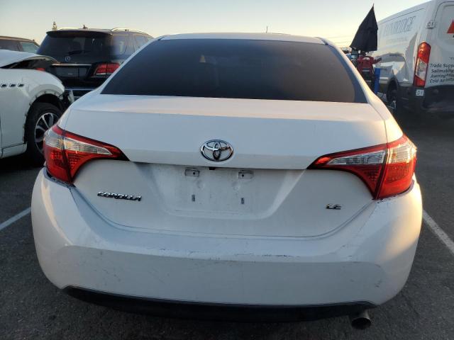 Photo 6 from auction – 2014 TOYOTA COROLLA L with VIN 5YFBURHE6EP131741