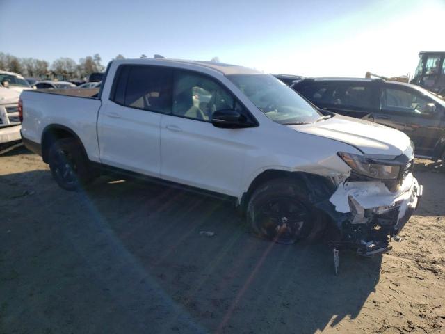 Photo 4 from auction – 2022 HONDA RIDGELINE with VIN 5FPYK3F84NB030100