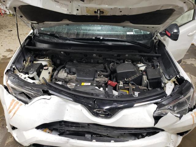 Photo 11 from auction – 2018 TOYOTA RAV4 LE with VIN JTMBFREV3JJ211401