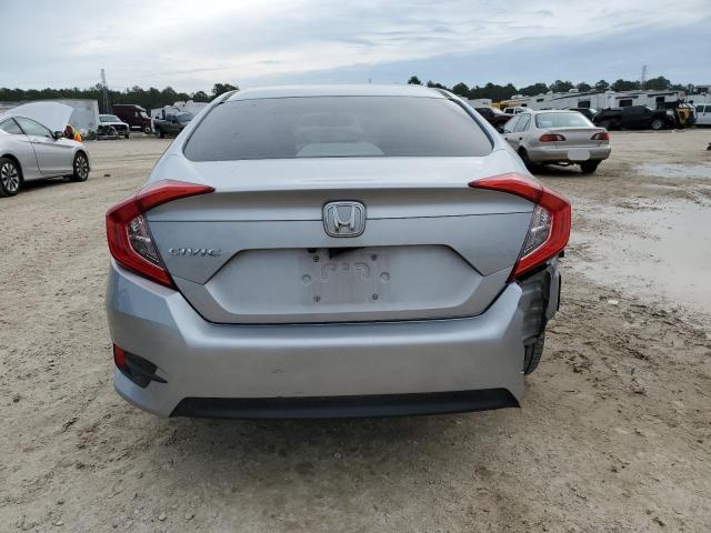 Photo 6 from auction – 2018 HONDA CIVIC LX with VIN 2HGFC2F50JH603321