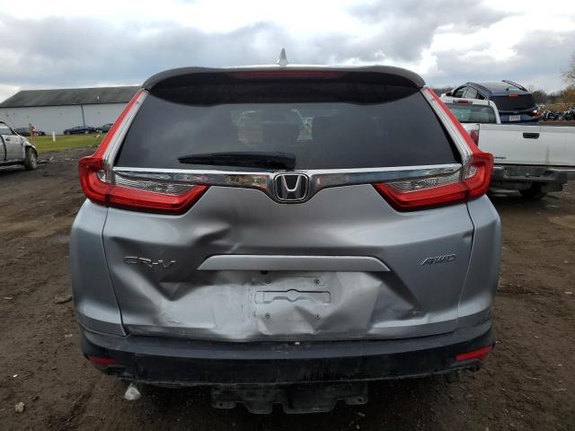 Photo 6 from auction – 2018 HONDA CR-V EX with VIN 7FARW2H54JE100661
