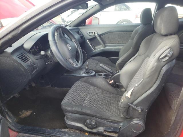 Photo 7 from auction – 2004 HYUNDAI TIBURON with VIN KMHHM65DX4U150102