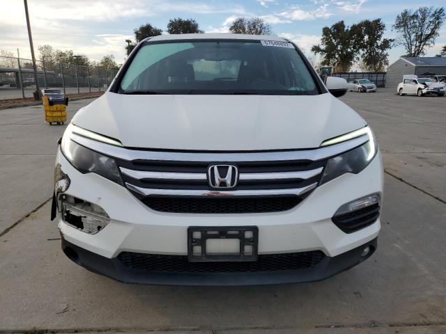 Photo 5 from auction – 2018 HONDA PILOT EXLN with VIN 5FNYF5H77JB024556