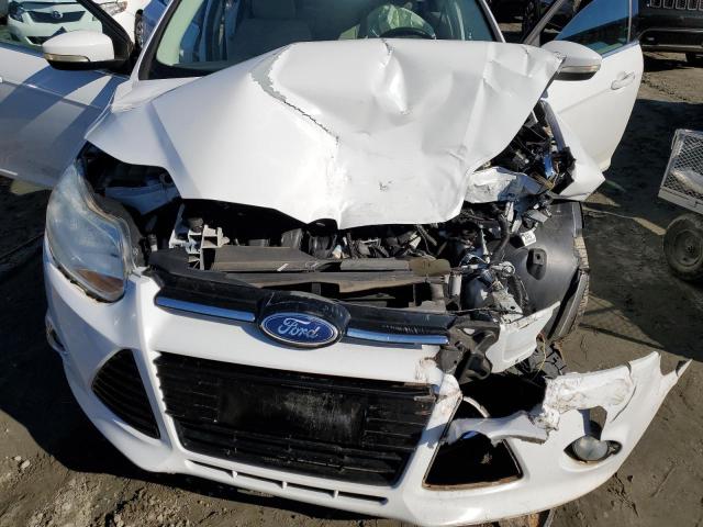 Photo 11 from auction – 2012 FORD FOCUS SEL with VIN 1FAHP3H29CL462555