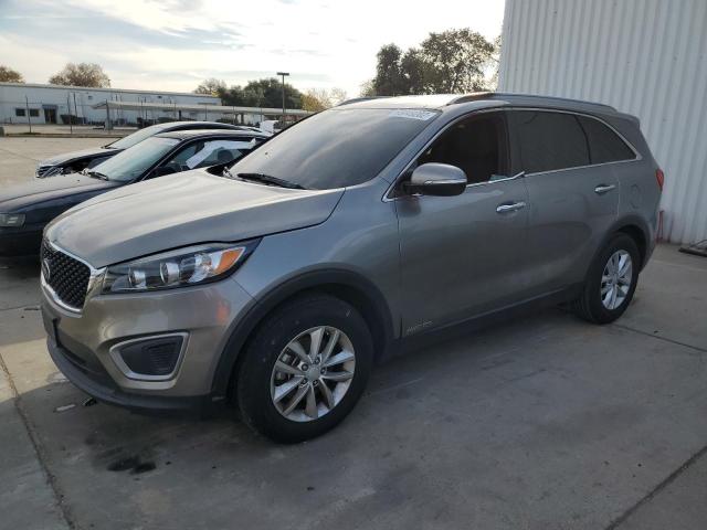 KIA SORENTO LX 2016 with VIN 5XYPGDA55GG033723 - Photo from auction