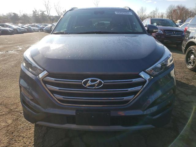 Photo 5 from auction – 2018 HYUNDAI TUCSON VAL with VIN KM8J3CA28JU686792