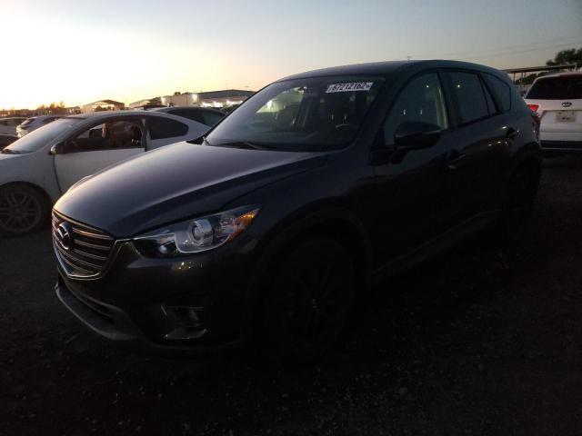 MAZDA CX-5 TOURI 2016 with VIN JM3KE2CYXG0712461 - Photo from auction