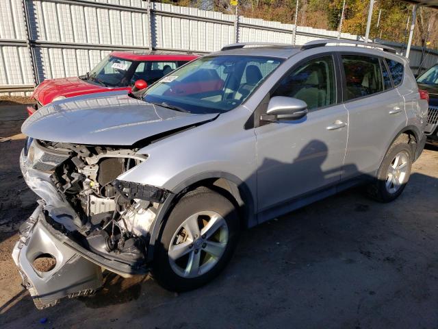 TOYOTA RAV4 XLE 2014 with VIN 2T3WFREV0EW103052 - Photo from auction