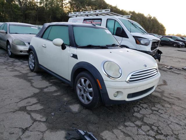 Photo 4 from auction – 2009 MINI COOPER with VIN WMWMR33509TU95552