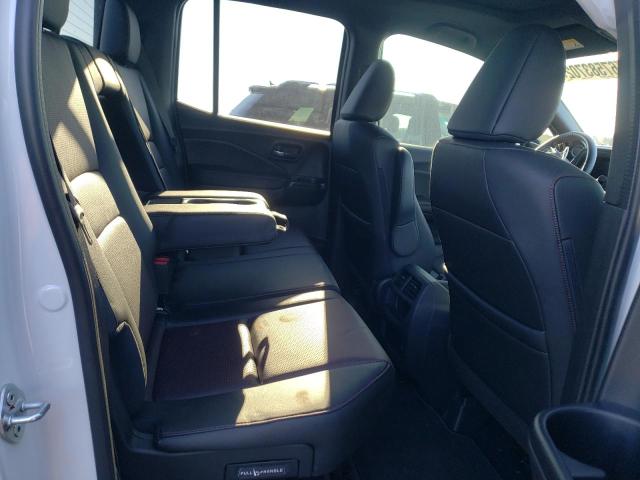 Photo 10 from auction – 2022 HONDA RIDGELINE with VIN 5FPYK3F84NB030100