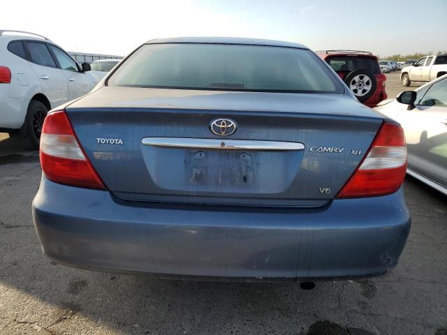 Photo 6 from auction – 2003 TOYOTA CAMRY LE with VIN 4T1BF30K23U560928