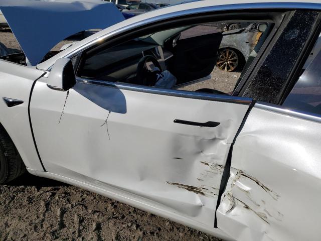 Photo 7 from auction – 2018 TESLA MODEL 3 with VIN 5YJ3E1EA8JF059676