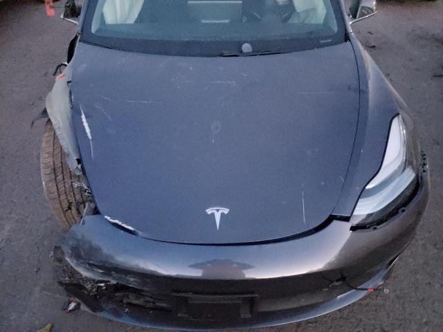Photo 11 from auction – 2018 TESLA MODEL 3 with VIN 5YJ3E1EB6JF090868