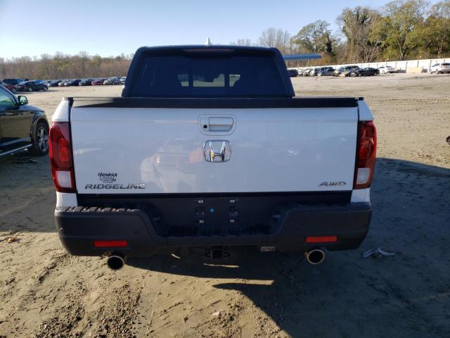 Photo 6 from auction – 2022 HONDA RIDGELINE with VIN 5FPYK3F84NB030100