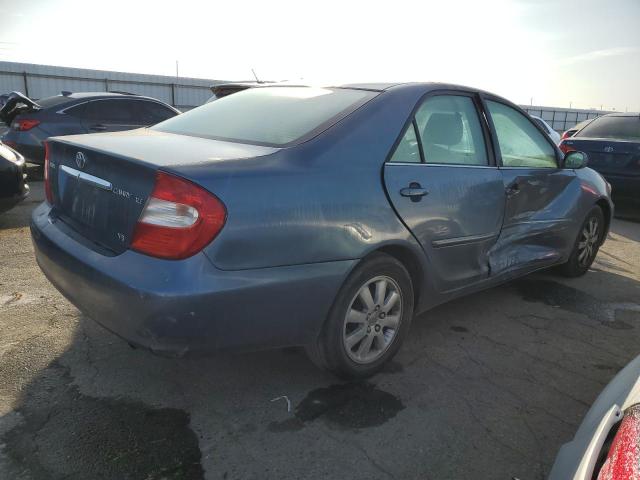 Photo 3 from auction – 2003 TOYOTA CAMRY LE with VIN 4T1BF30K23U560928