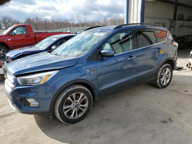 FORD ESCAPE SE 2018 with VIN 1FMCU9GDXJUA18980 - Photo from auction