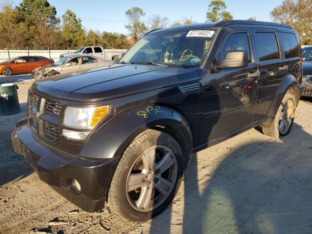 DODGE NITRO HEAT 2011 with VIN 1D4PU4GX1BW606973 - Photo from auction
