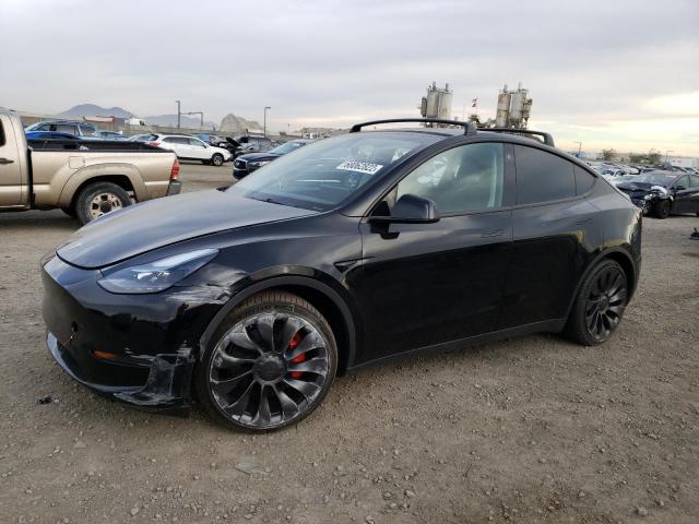 TESLA MODEL Y 2022 with VIN 7SAYGDEF2NF342077 - Photo from auction