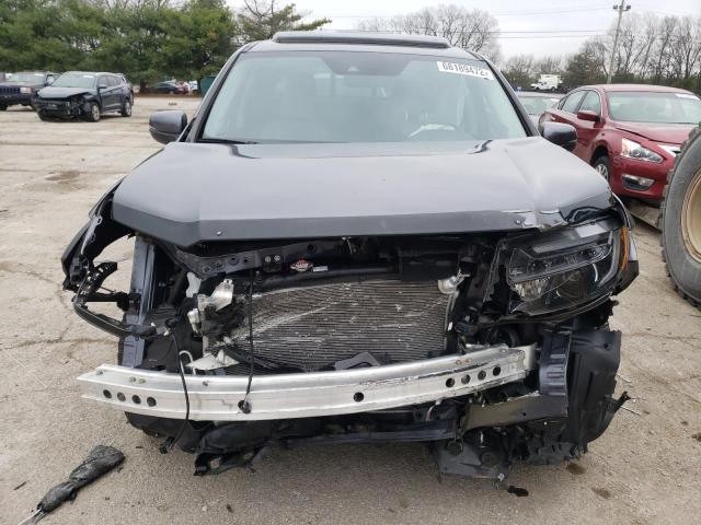 Photo 5 from auction – 2021 HONDA RIDGELINE with VIN 5FPYK3F58MB011280