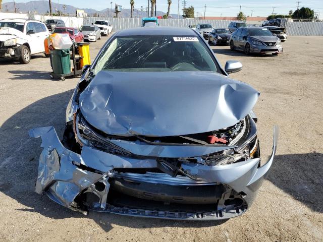 Photo 5 from auction – 2022 TOYOTA COROLLA LE with VIN JTDEAMDE7NJ059502