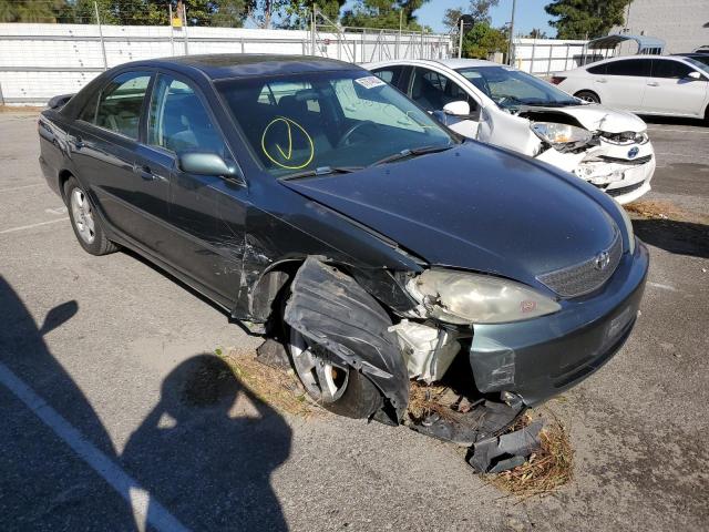 Photo 4 from auction – 2004 TOYOTA CAMRY LE with VIN JTDBE32K640249516
