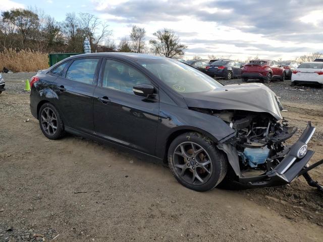 Photo 4 from auction – 2014 FORD FOCUS SE with VIN 1FADP3F24EL353747