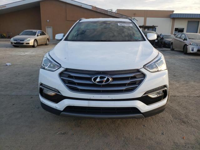 Photo 5 from auction – 2017 HYUNDAI SANTA FE S with VIN 5NMZU3LBXHH006667