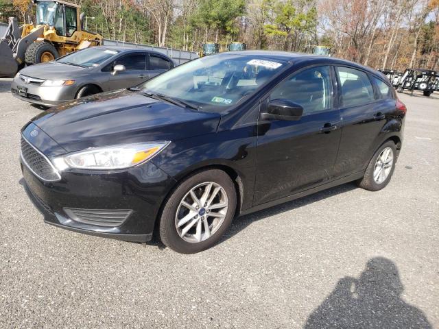 FORD FOCUS SE 2018 with VIN 1FADP3K22JL309777 - Photo from auction