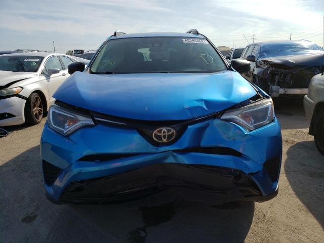 Photo 5 from auction – 2017 TOYOTA RAV4 LE with VIN JTMZFREV4HJ111803