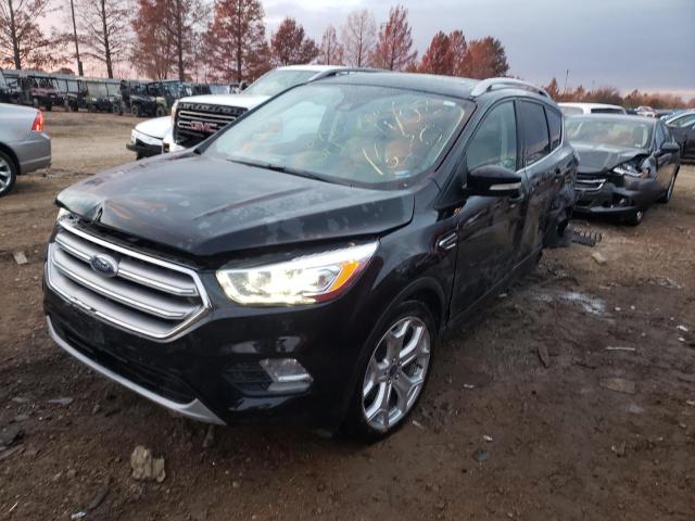 FORD ESCAPE TIT 2017 with VIN 1FMCU9J91HUC71670 - Photo from auction