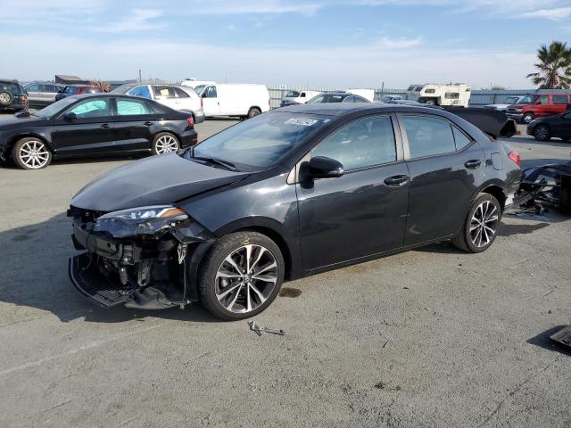 TOYOTA COROLLA L 2018 with VIN 2T1BURHEXJC072574 - Photo from auction