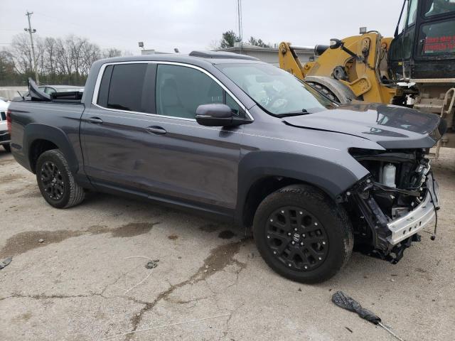Photo 4 from auction – 2021 HONDA RIDGELINE with VIN 5FPYK3F58MB011280