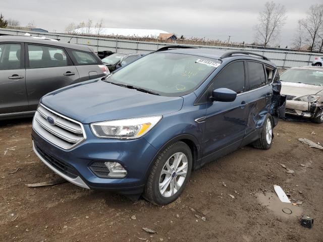 FORD ESCAPE 2018 with VIN 1FMCU0GD8JUB08558 - Photo from auction
