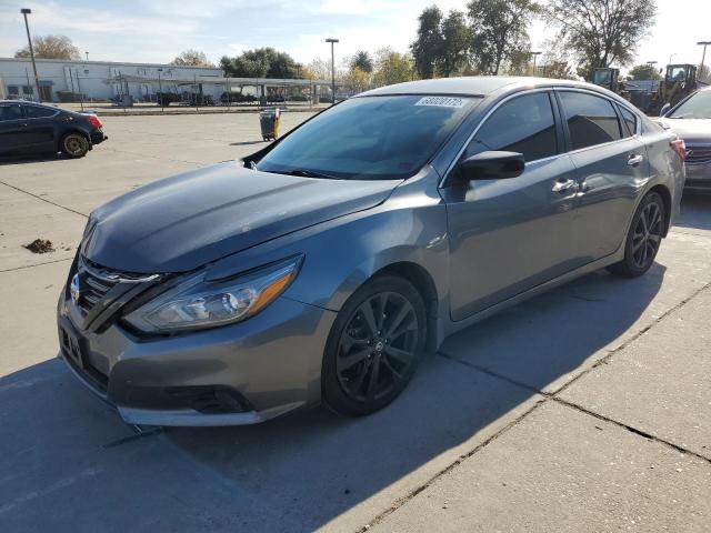 NISSAN ALTIMA 2.5 2018 with VIN 1N4AL3AP3JC283475 - Photo from auction