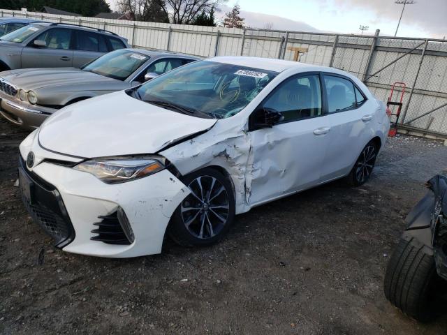 TOYOTA COROLLA L 2018 with VIN 5YFBURHEXJP760929 - Photo from auction