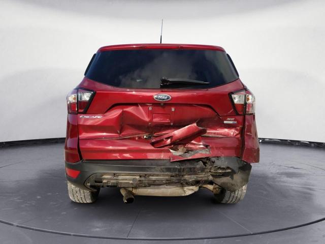 Photo 6 from auction – 2018 FORD ESCAPE SE with VIN 1FMCU9GD5JUC58664