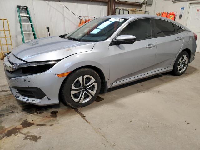 HONDA CIVIC LX 2018 with VIN 2HGFC2F58JH010435 - Photo from auction