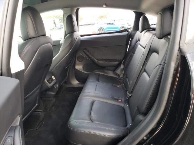 Photo 11 from auction – 2022 TESLA MODEL Y with VIN 7SAYGDEF2NF342077