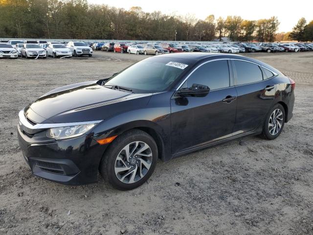 HONDA CIVIC EX 2017 with VIN 19XFC2F74HE058973 - Photo from auction