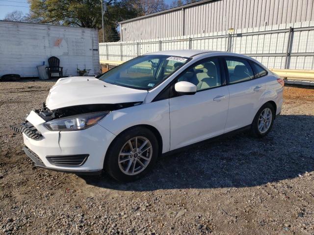 FORD FOCUS SE 2018 with VIN 1FADP3F28JL326867 - Photo from auction