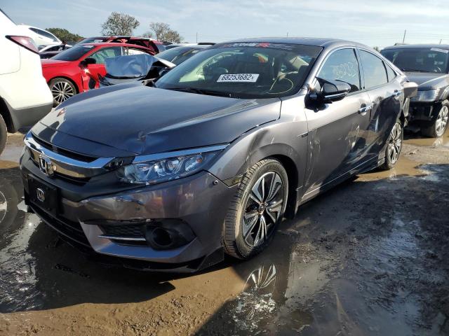 Photo 1 from auction – 2018 HONDA CIVIC EX with VIN JHMFC1F31JX015350