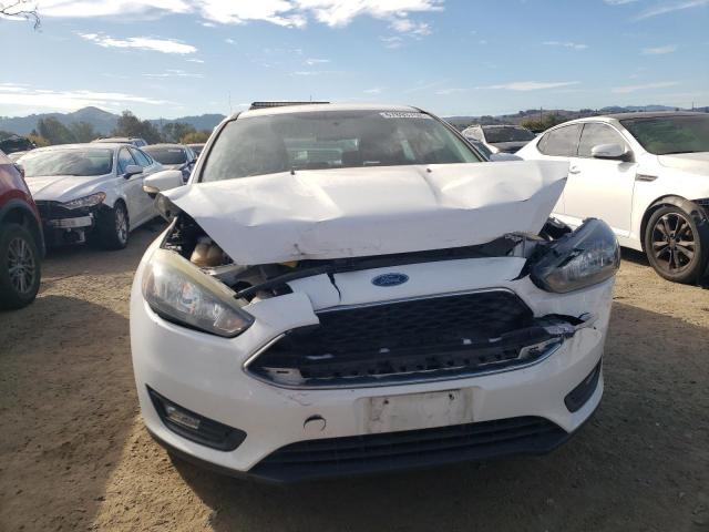 Photo 5 from auction – 2016 FORD FOCUS SE with VIN 1FADP3K29GL234620