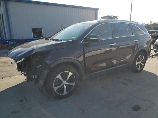 KIA SORENTO EX 2016 with VIN 5XYPH4A10GG011493 - Photo from auction