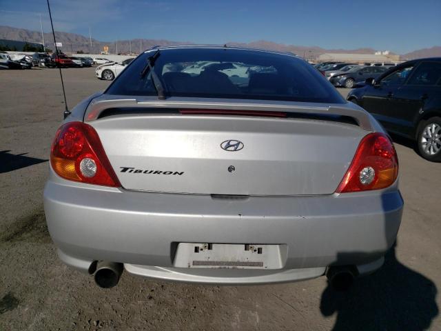 Photo 6 from auction – 2004 HYUNDAI TIBURON with VIN KMHHM65D14U143085