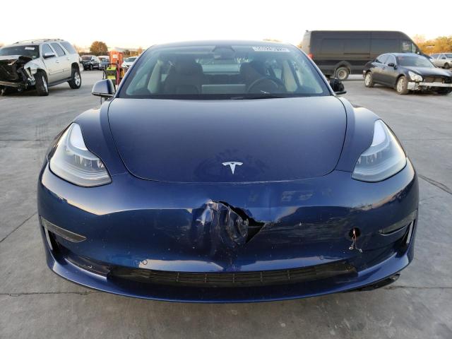 Photo 5 from auction – 2022 TESLA MODEL 3 with VIN 5YJ3E1EB6NF305025