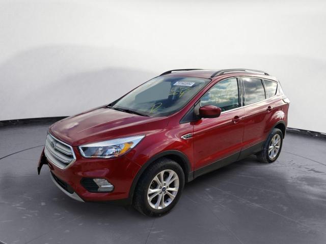 FORD ESCAPE SE 2018 with VIN 1FMCU9GD5JUC58664 - Photo from auction