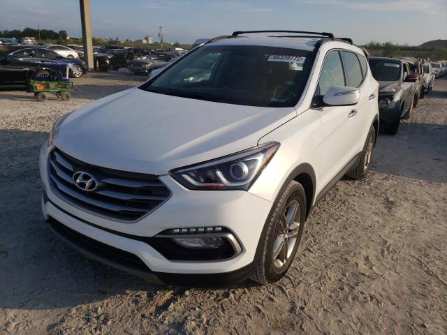 HYUNDAI SANTA FE S 2018 with VIN 5NMZU3LB1JH077343 - Photo from auction